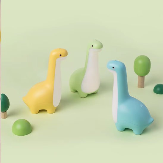 Veilleuse silicone dinosaure bébé - vert jaune bleu - Bébé Petit Nuage